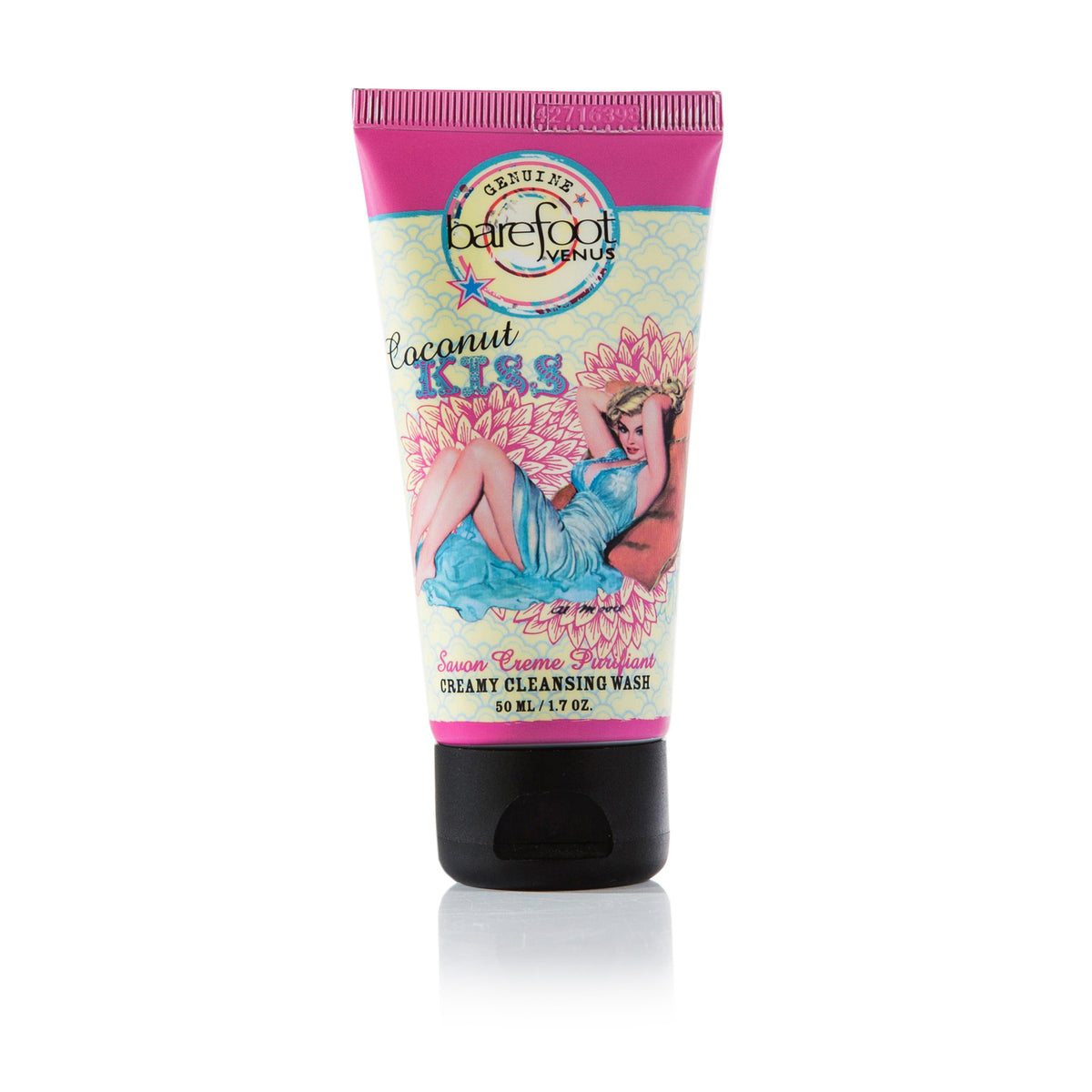 Tube of Barefoot Venus Coconut Kiss creamy cleansing wash mini featuring a woman in a blue dress with a floral background design with a white background.