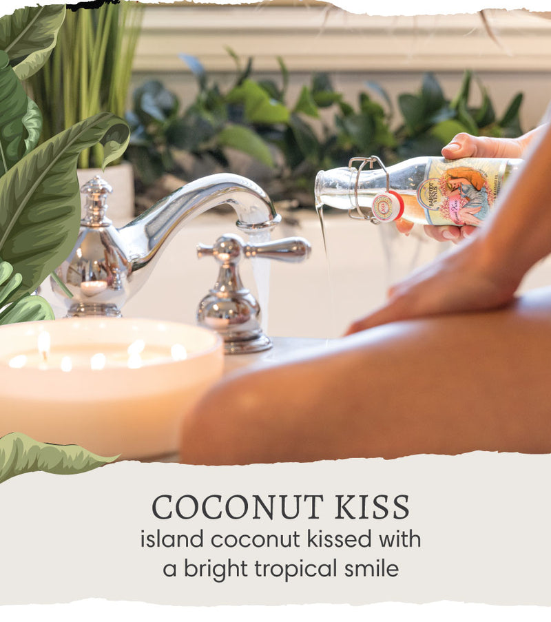 Person pouring Barefoot Venus Coconut Kiss massage & bath oil into a bath tub with text 'Coconut Kiss - Island coconut kissed with a bright, tropical smile.'.