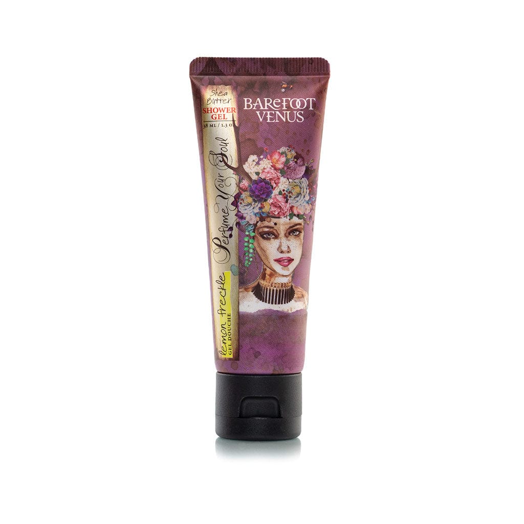 Tube of Barefoot Venus Coconut Kiss creamy cleansing wash mini featuring a woman in a blue dress with a floral background design with a white background.