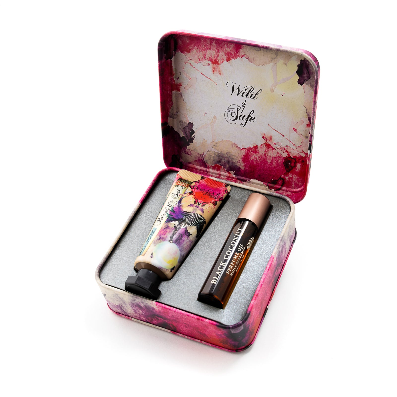 Container for Barefoot Venus Black Coconut perfect pair open containing an instant hand repair and perfume oil with a floral zebra design on the packaging, text reads 'Wild & Safe'.