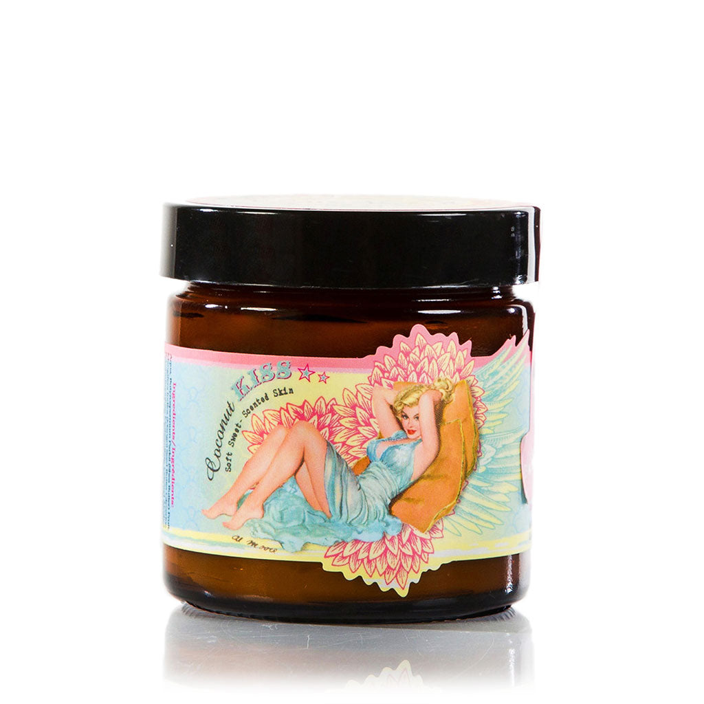 Jar of Barefoot Venus Coconut Kiss instant hand repair featuring a woman in a blue dress with a floral background design on a white background.