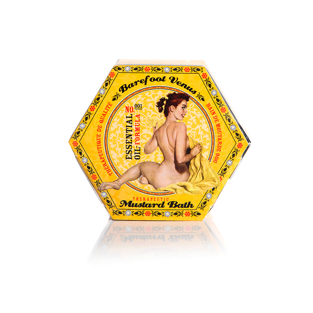 Packaging of Barefoot Venus Mustard Bath with illustration of a woman. The package is yellow with floral patterns and text including 'therapeutic mustard bath' and 'essential oil formula'.