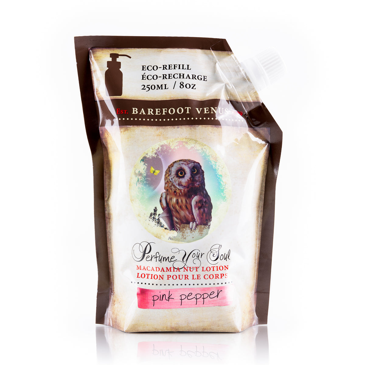 A pouch of Pink Pepper Lotion by Barefoot Venus with an owl design and a label indicating it is an eco-refill Macadamia Nut Lotion.