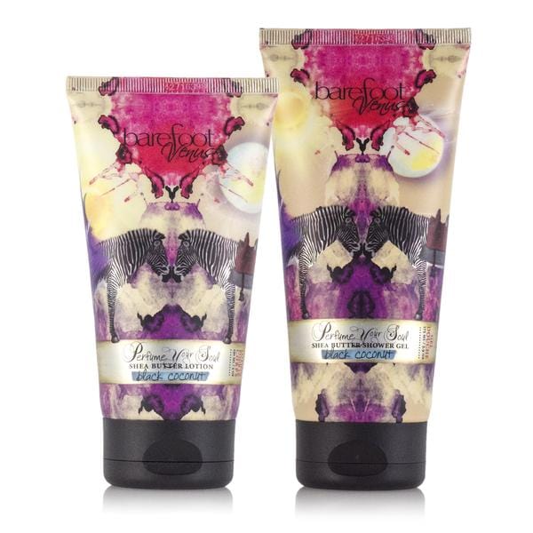 Two bottles of Barefoot Venus body care products, one lotion and one shower gel, with colourful packaging featuring an illustration of zebras.