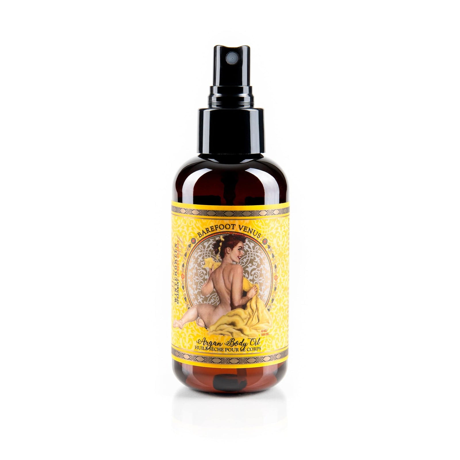 A spray bottle of Barefoot Venus Essential Oil Argan body oil with a vintage woman design on the packaging on a white background.