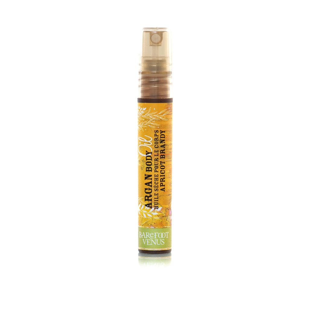 10 Barefoot Venus Mini Argan Oils displayed in a circle. Scents include Coconut Kiss, Maple Blondie, The Vanilla Effect, Wintergreen Spearmint, Lemon Freckle, Wild Ginger & Sweet Orange, Pink Pepper, Lavender Smoke, Ruby Red.
