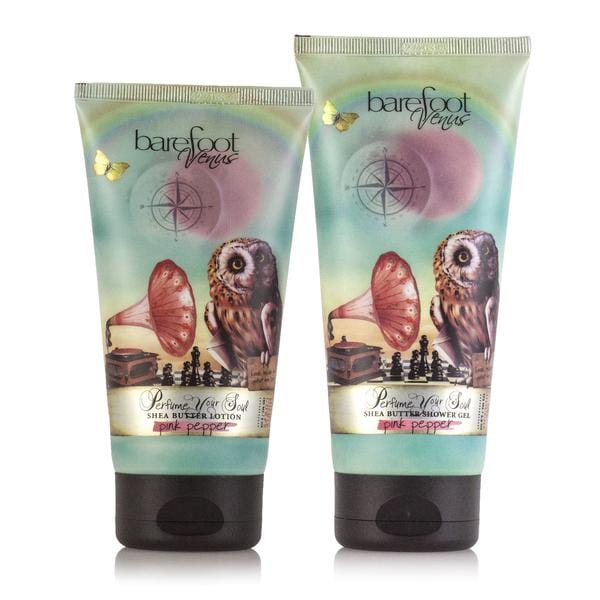 Two bottles of Barefoot Venus body care products, one lotion and one shower gel, with colourful packaging featuring an illustration of an owl and a gramophone.